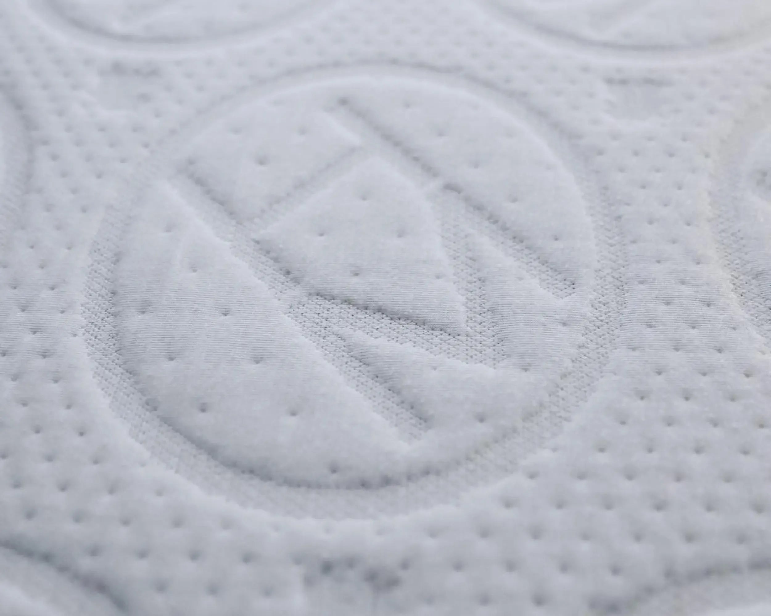 Close-up of Haven logo on mattress.