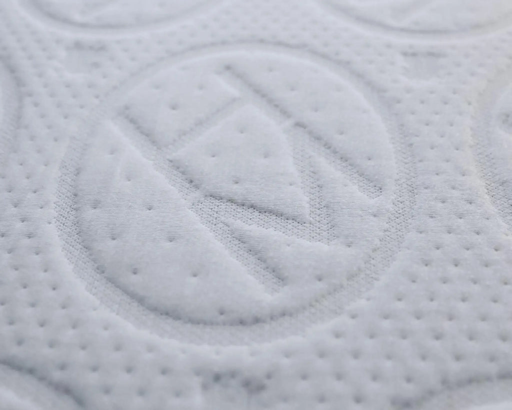 Close-up of Haven logo on mattress.