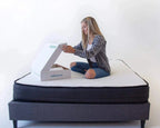 Teenager relaxing on the HIBER mattress, Canadian-made with plant-based, eco-friendly materials that provide natural comfort and support for growing bodies.