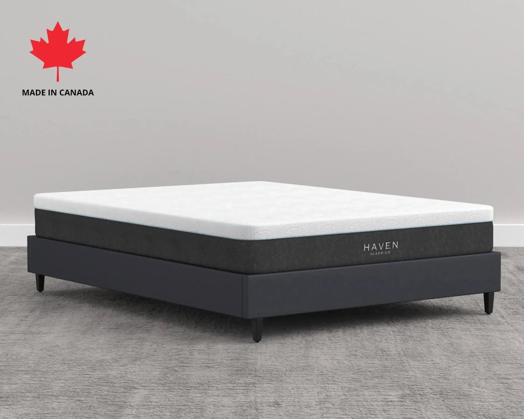 Mattress with Haven branding on a gray floor, featuring a red maple leaf logo.
