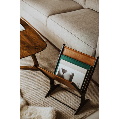 Clean, bold lines, classic brown-leather, and a complimentary jet-black frame make this stunning magazine rack. Keep your ...