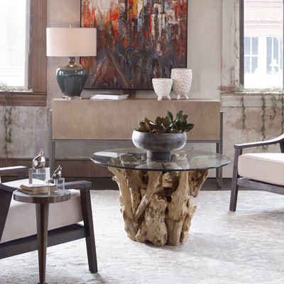 Natural, Unfinished Teak Driftwood Sculpted Into A Sturdy Table With A Clear Glass Top.