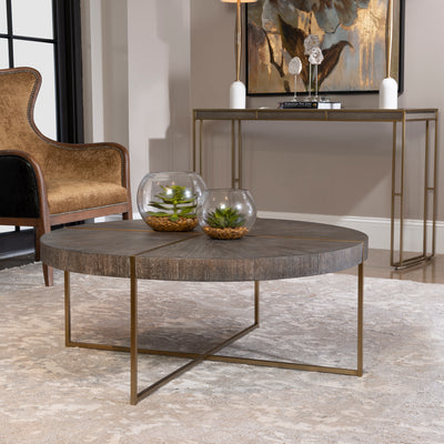 Contemporary In Style, This Coffee Table Features A Stainless Steel Framework Finished In A Brushed Brass With A Round Aca...