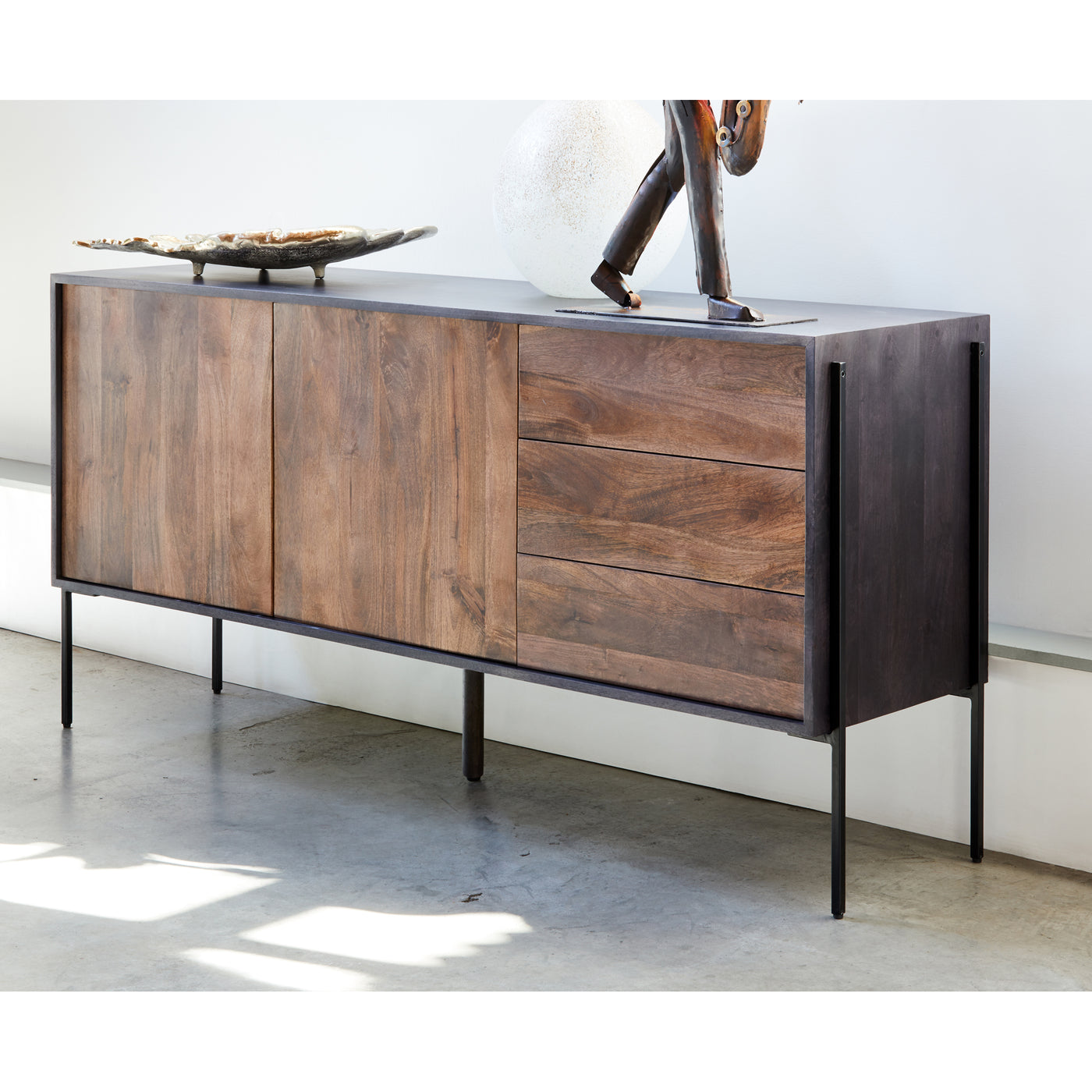 Minimalism meets industrial design with the Tobin Sideboard. Store your dinnerware on two spacious shelves and your silver...