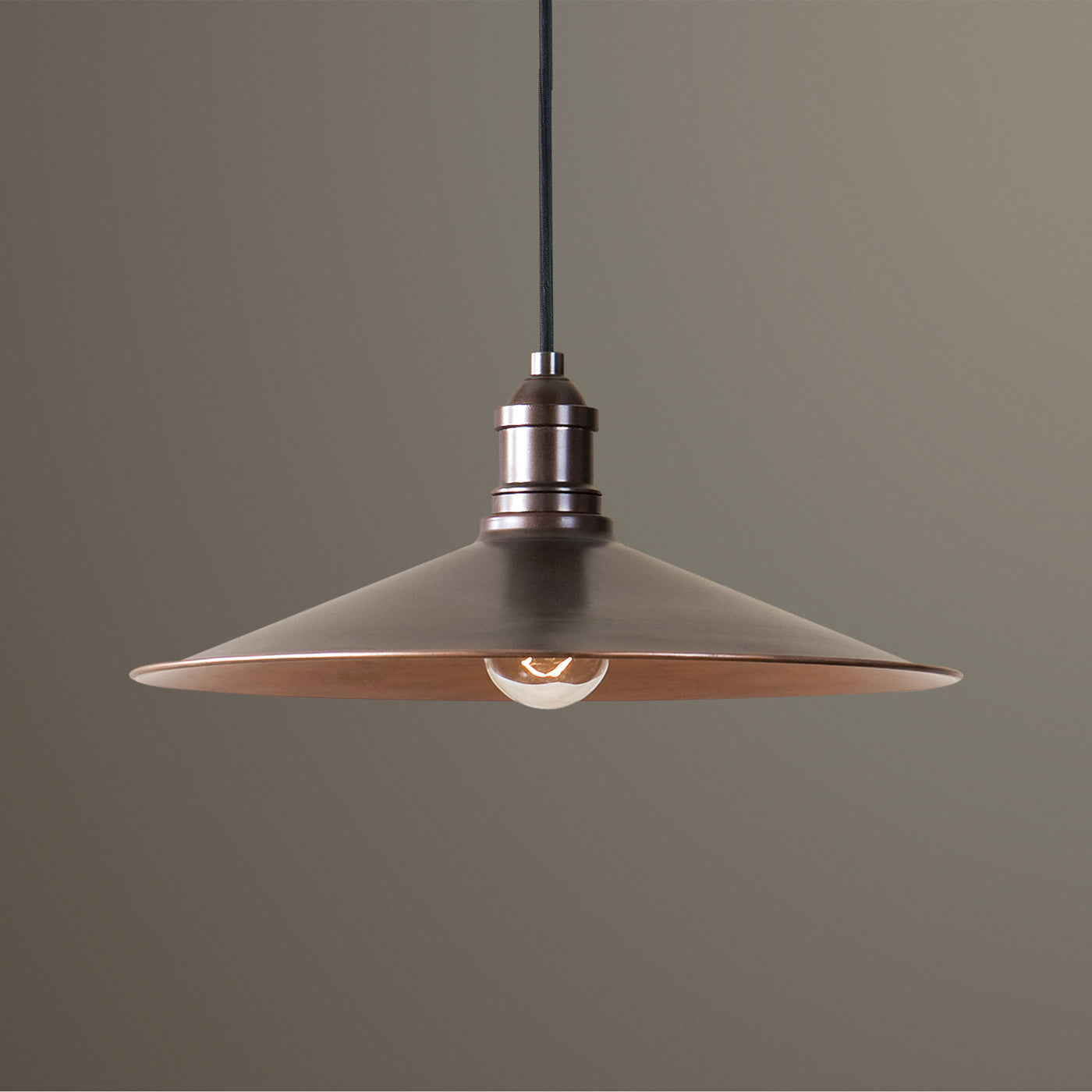 The Antique Copper Finish Adds A Sleek Look To This Classic Pendant. Includes 15' Cord For Adjustable Installation.