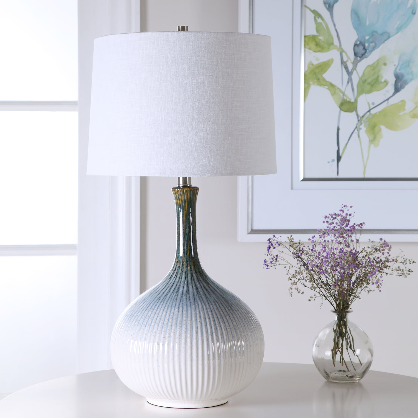 Mid-century Inspired Table Lamp Has A Fluted Ceramic Base With Noticeable Ribbed Texture And Is Finished In A Cream, Light...