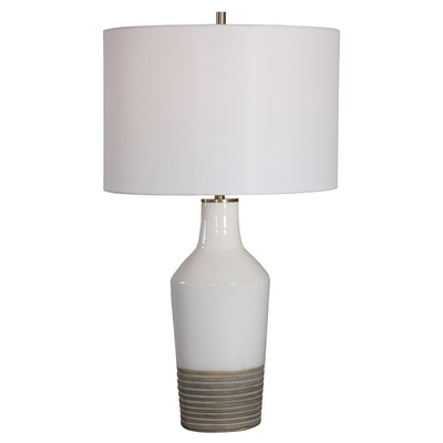 This Ceramic Lamp Features A White Crackle Glaze Finish Paired With A Ribbed Textured Bottom Half Finished In An Aged Terr...