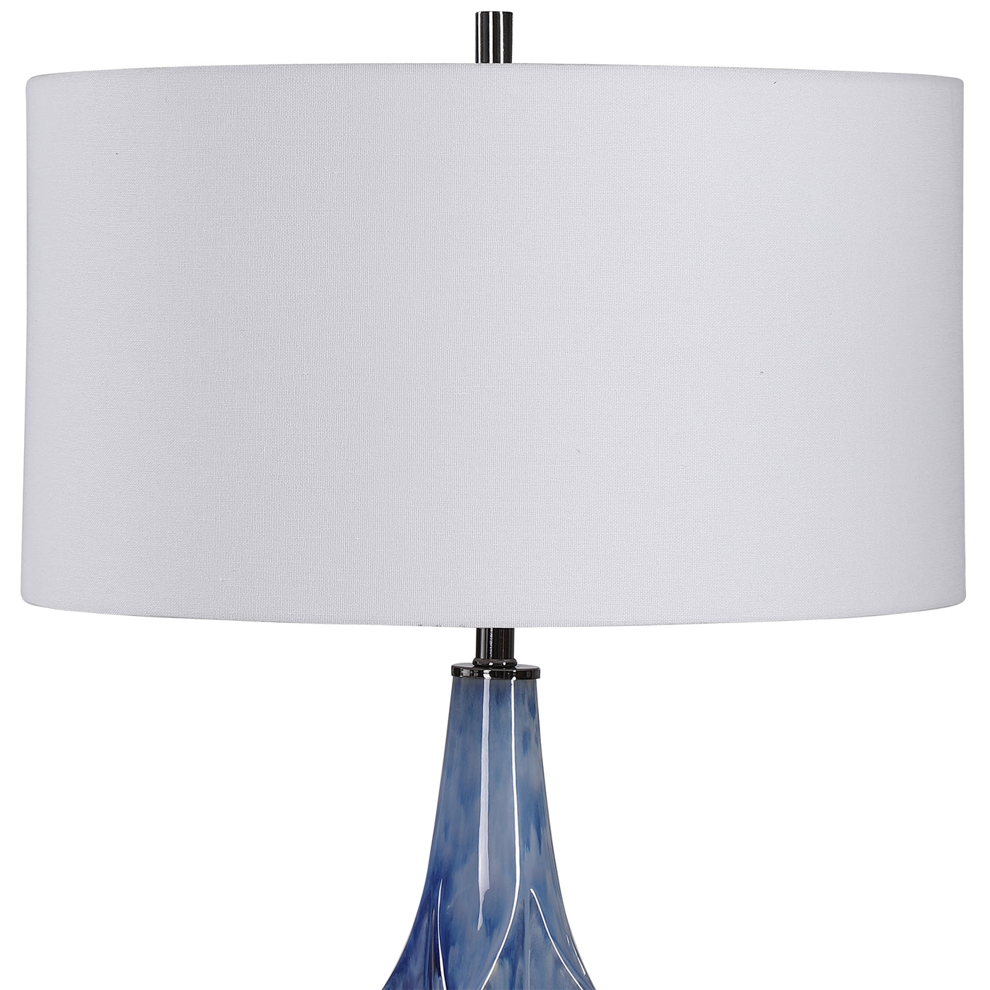 This Ceramic Table Lamp Is Finished In A Beautiful Reactive Indigo Blue Glaze, Accented By Elegant, Polished Nickel And Cr...
