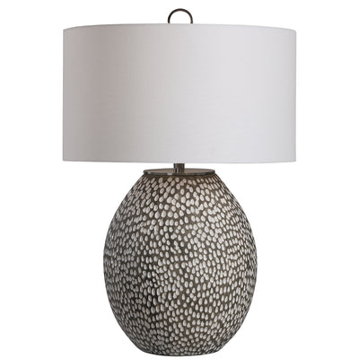 This Ceramic Table Lamp Features A Heavily Pitted Surface, Finished In A Combination Of Brushed Rustic Gray And Crackled G...