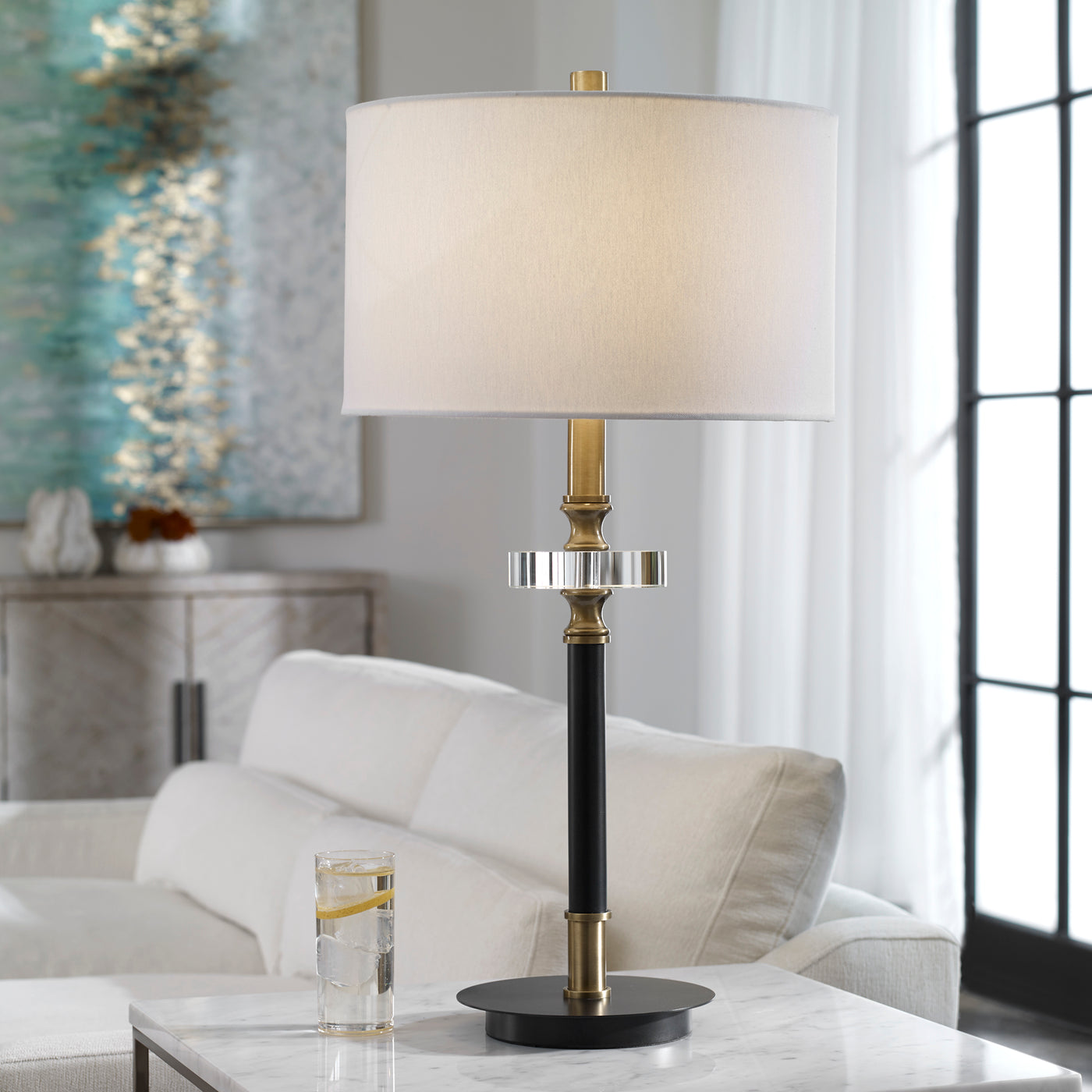 Traditional Elegance Is Showcased In This Table Lamp, Finished In An Aged Black With Antique Brass Plated Accents And A Th...