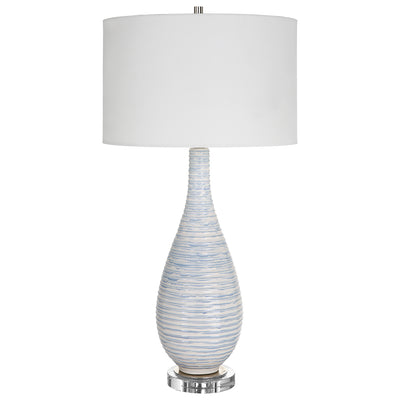 This Ceramic Table Lamp Features An Elegant Fluted Shape With Ribbed Texture Finished In A Soft Blue And White Drip Glaze....
