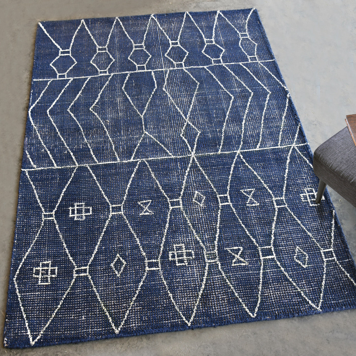 Hand Woven, Over Dyed, Indigo Blue Wool, Featuring A Bold White Tribal Inspired Design.