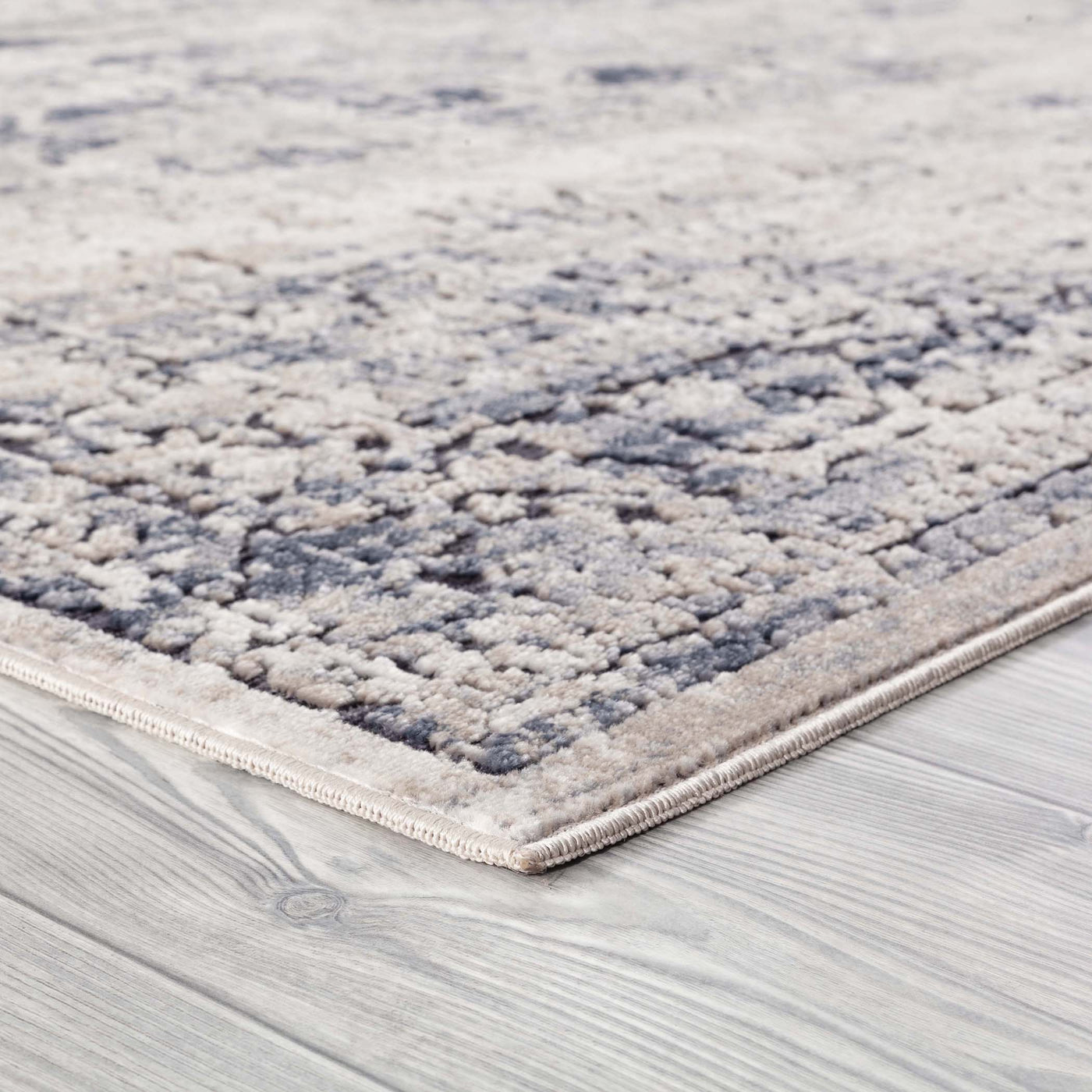 This Power Loomed Rug Features A Combination Of Polypropylene And Chenille In Tones Of Ivory, Beige, And Light Gray With S...