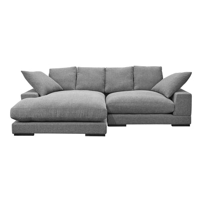 Sink into the luxurious cushions of the Plunge sectional sofa to experience ultimate comfort and relaxation. Clean lines a...
