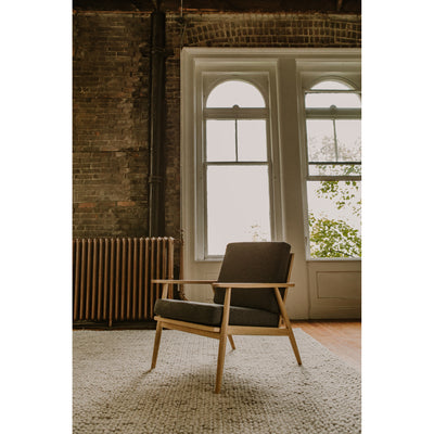 Elevate your living room aesthetic with the Harper lounge chair. This accent chair frame is made of solid Oak wood and has...