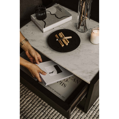 The perfect bedroom companion. A white marble tabletop lies firmly over acacia veneer based drawers. Its two soft-close co...
